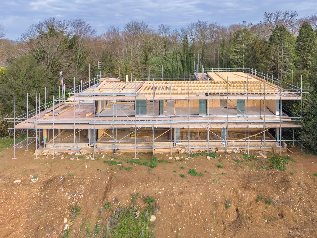 Building under construction with scaffolding surrounding the outside