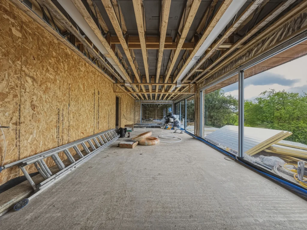 Room under construction with Posi-Joists forming the structure of the roof