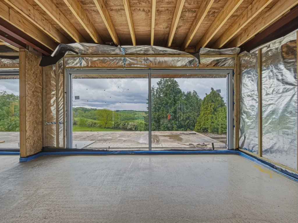 Room under construction with Posi-Joists forming the structure of the roof