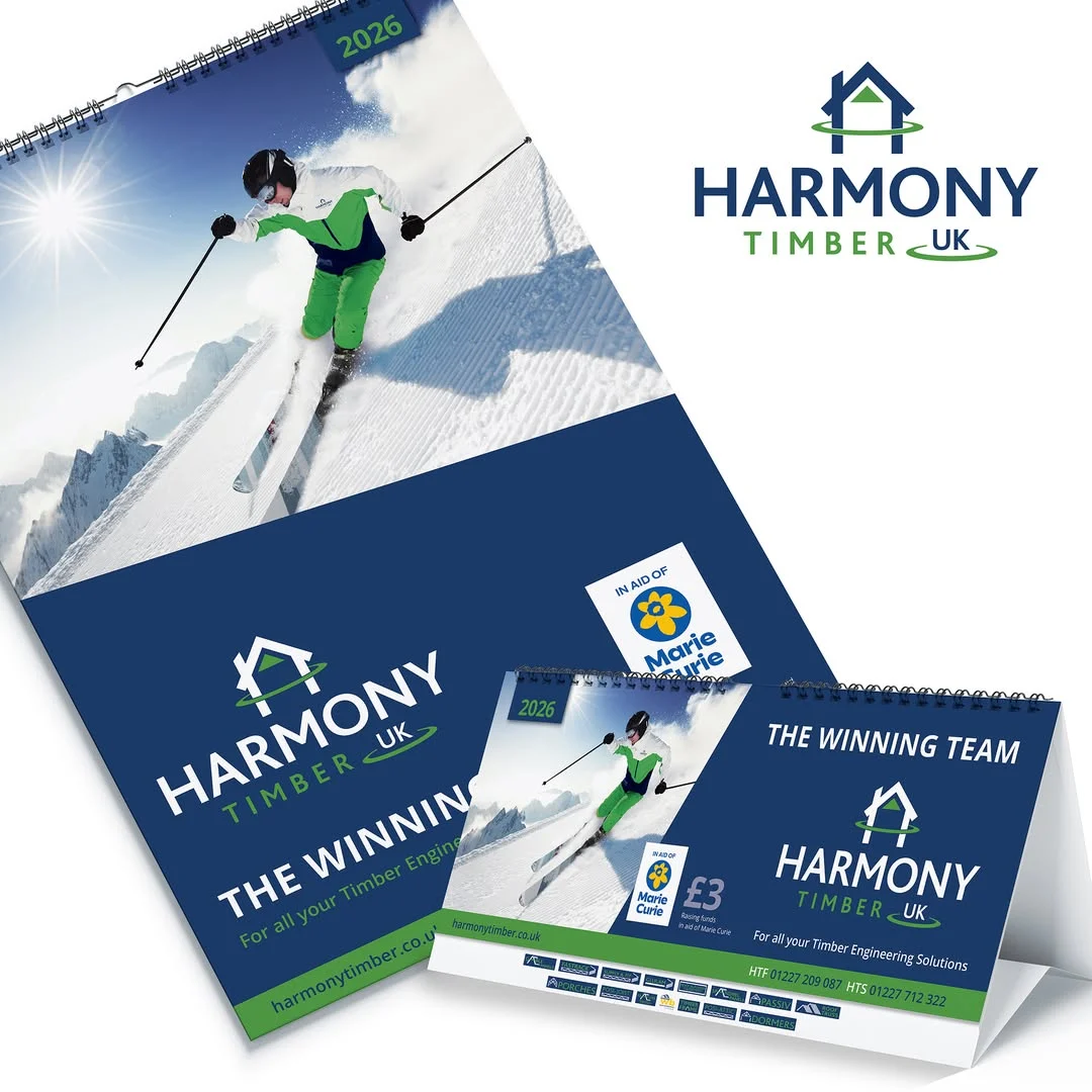 A Harmony calendar graphic feating an image of someone skiing and the Harmony logo on the front