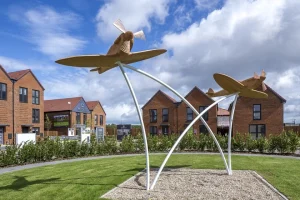 Spitfire aeroplane sculpture in a housing estate