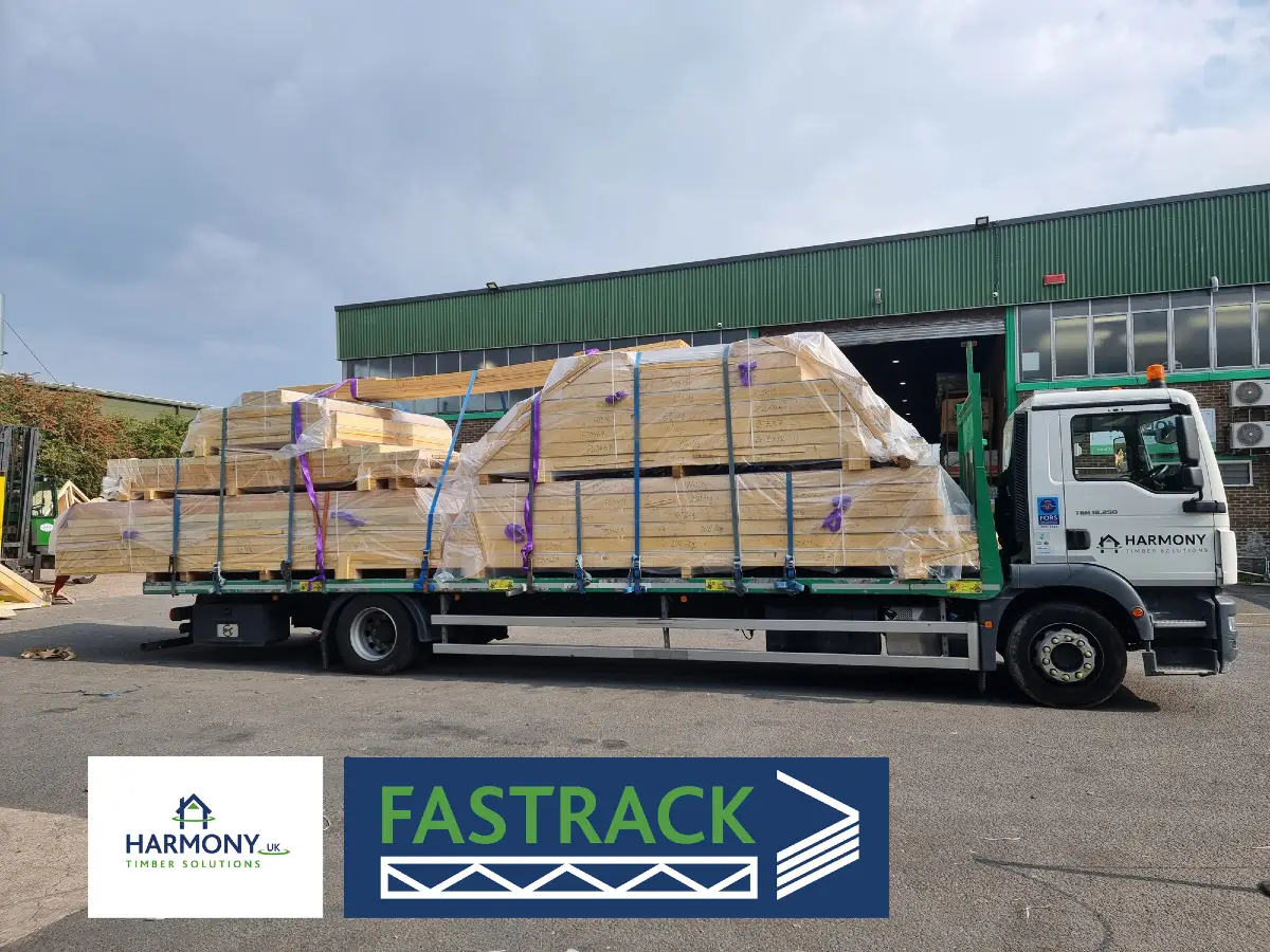 A flatbed lorry with timber products on